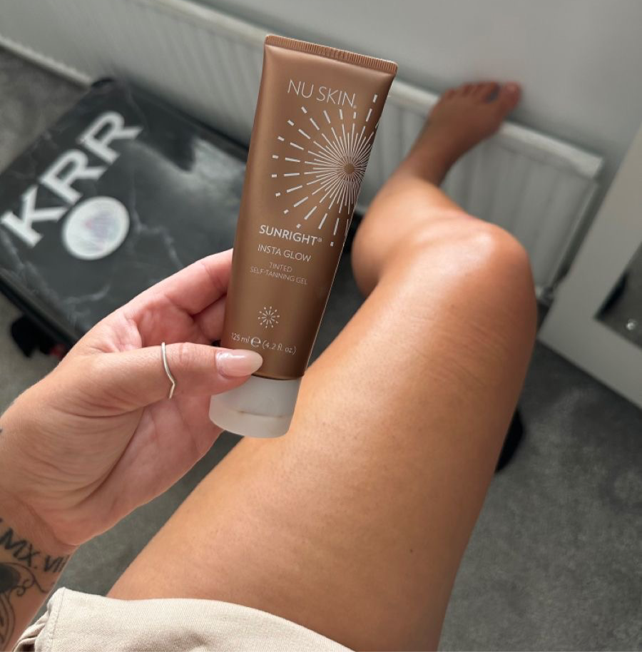 Apply Nu Skin Insta Glow for a natural tan on face and body
